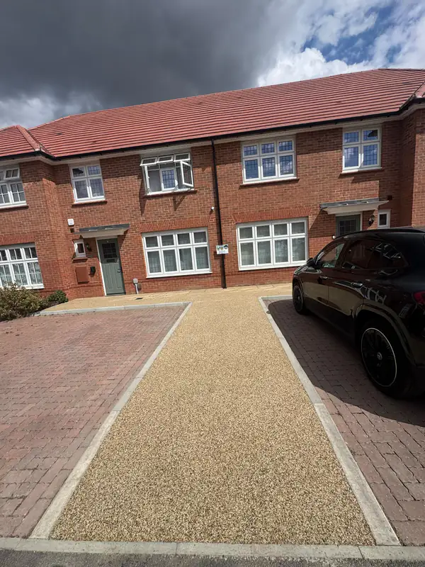 Resin bound front walkway between two block-paved drives