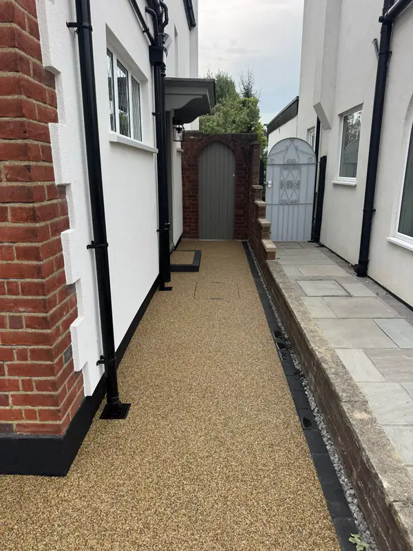Resin bound side path leading to a garden gate