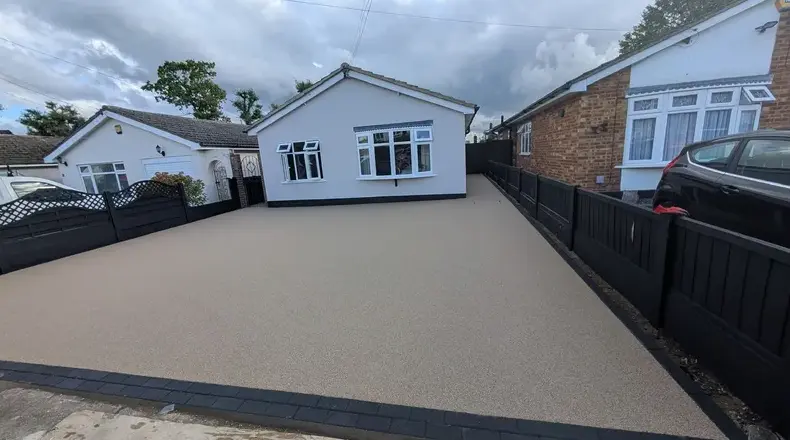kent resin driveways beige resin driveway bungalow dark fence