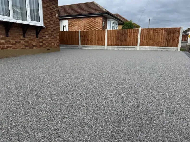 kent resin driveways grey resin driveway bungalow timber fence