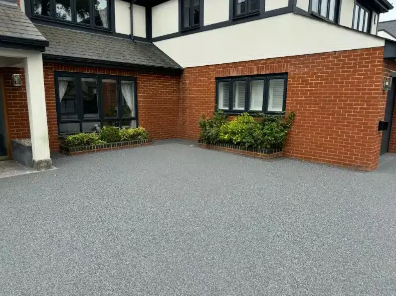 kent resin driveways grey resin driveway planters brick house