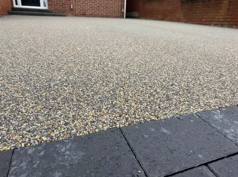 kent resin driveways natural resin closeup block paving edge