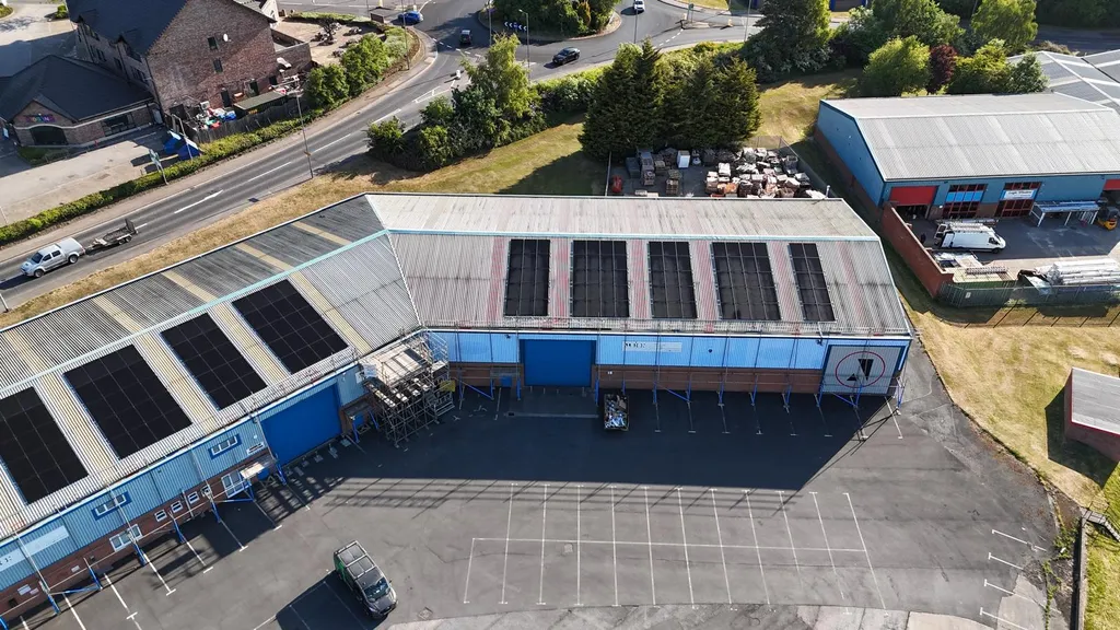 Commercial solar installation on industrial unit — rear view, Manchester