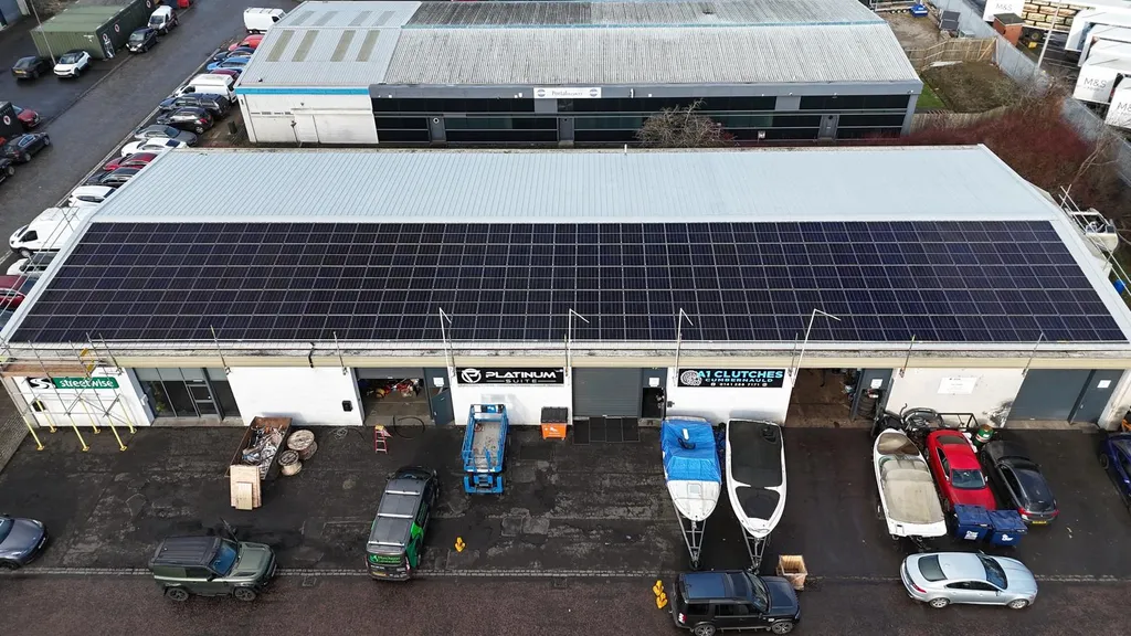 Commercial solar panels on workshop units — pitched roof, Manchester