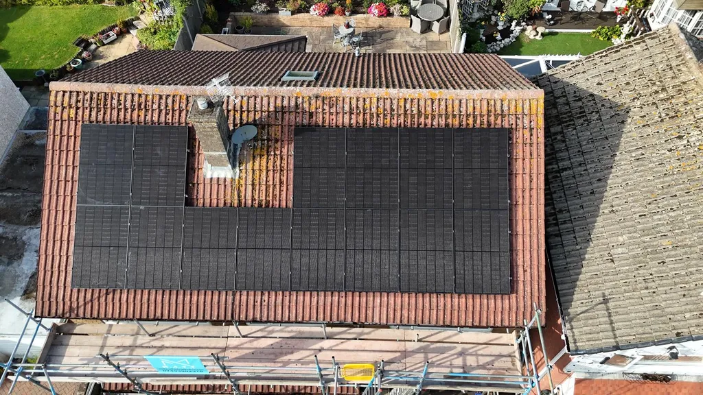 14-panel domestic solar installation on rear roof of Manchester home