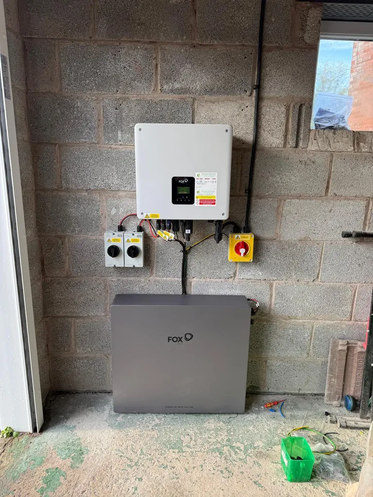 Fox ESS battery and inverter — garage breeze block wall, Manchester