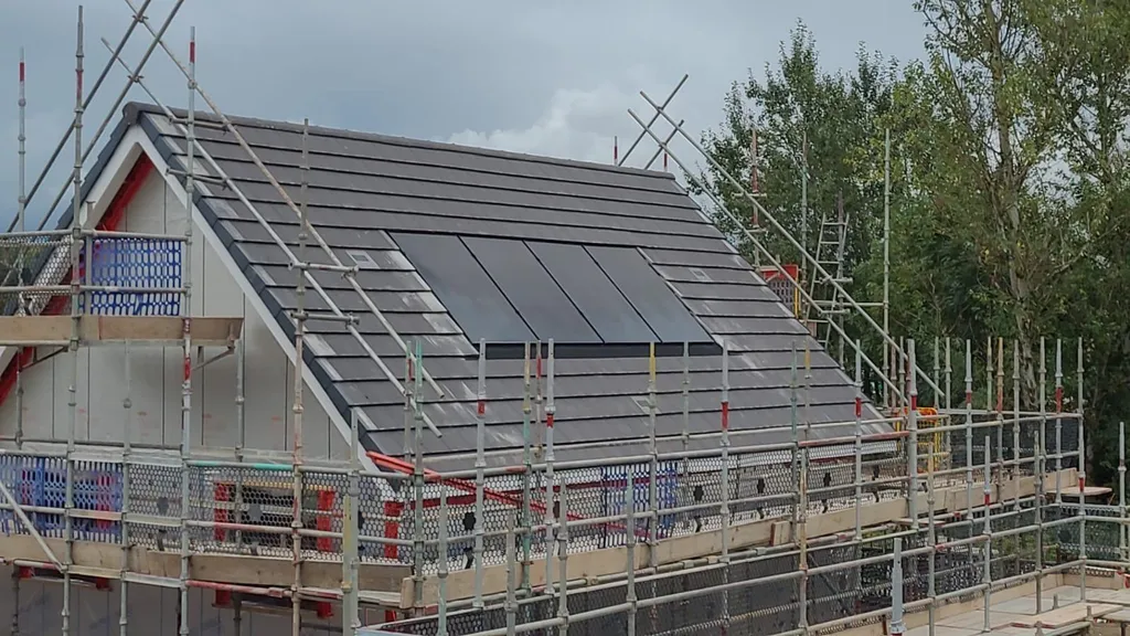 In-roof solar panels on new-build under construction, Manchester
