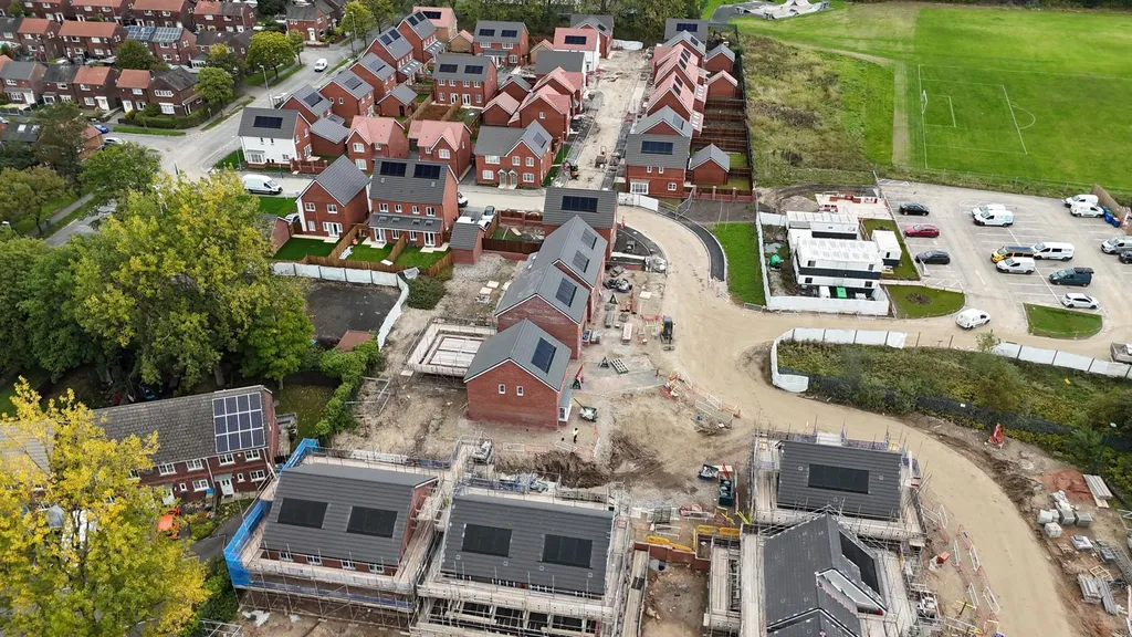Manchester new-build housing estate — solar panels, multiple phases