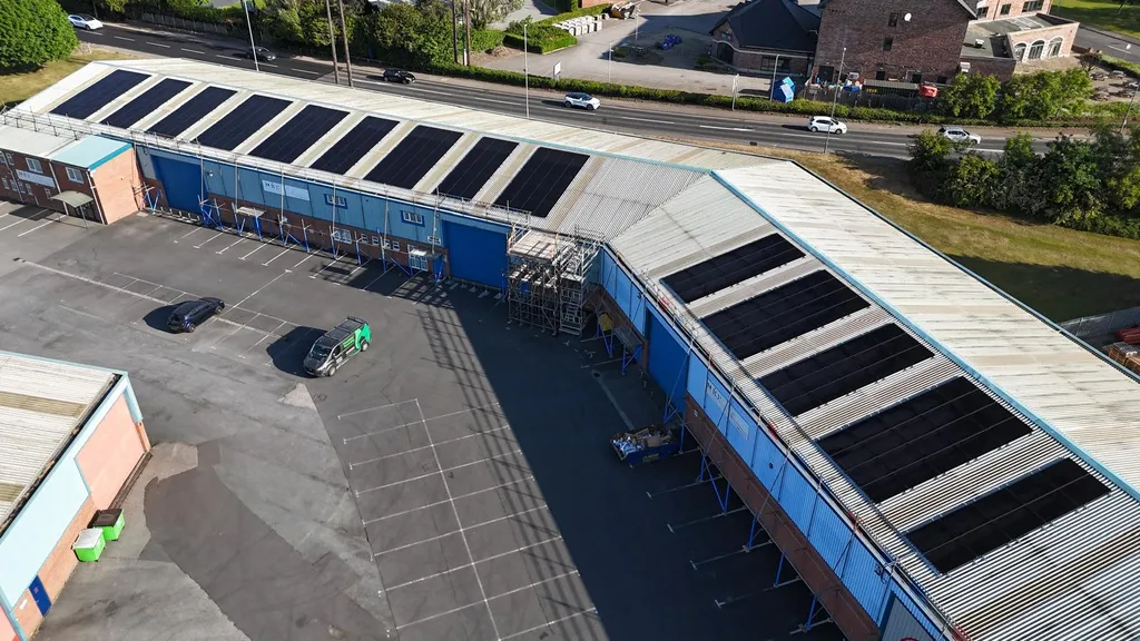 Manchester Renewables commercial solar panels on L-shaped warehouse
