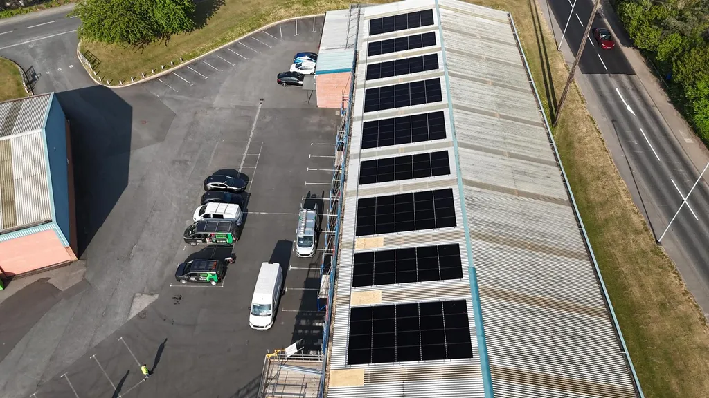 Commercial solar panel installation on a warehouse roof in Manchester