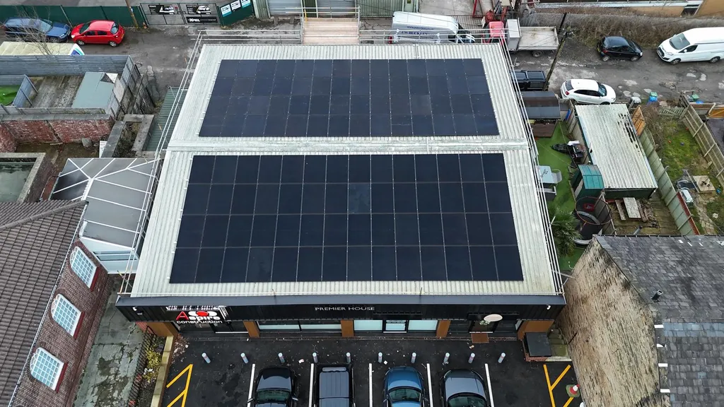 Manchester Renewables commercial solar PV on office roof — drone