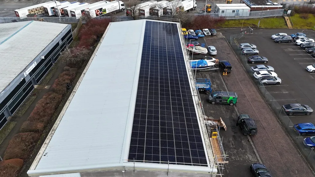 Manchester Renewables industrial solar installation — flat roof