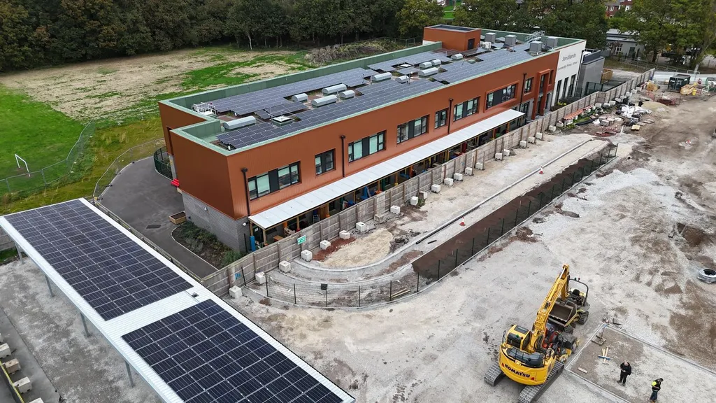 Manchester Renewables school solar panels — rooftop and canopy
