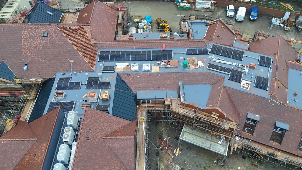 Solar panel installation on care home — multiple arrays, Manchester