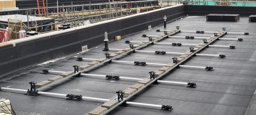Solar panel racking installation in progress — commercial, Manchester