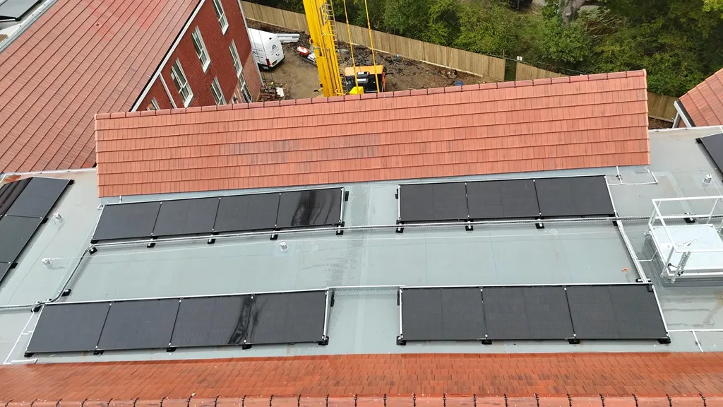 Solar panels on new-build care home — flat roof valley, Manchester