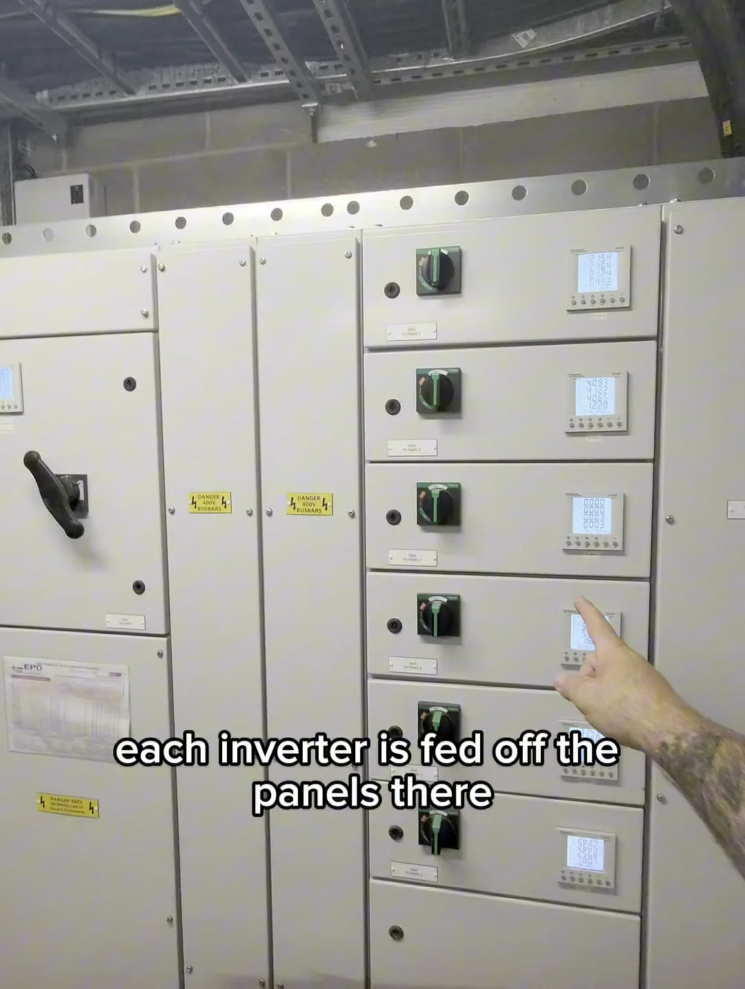 Inside the plant room at Deyes High School — six 100kW inverters (PV1 to PV6) for the 600kW solar system