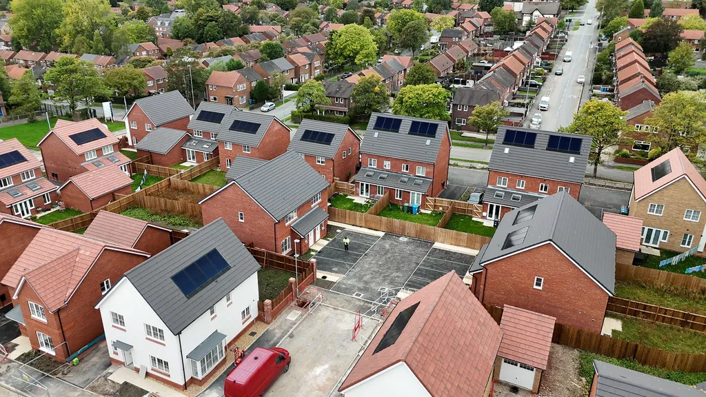 Ashton-under-Lyne housing development with solar panels — overhead view of estate