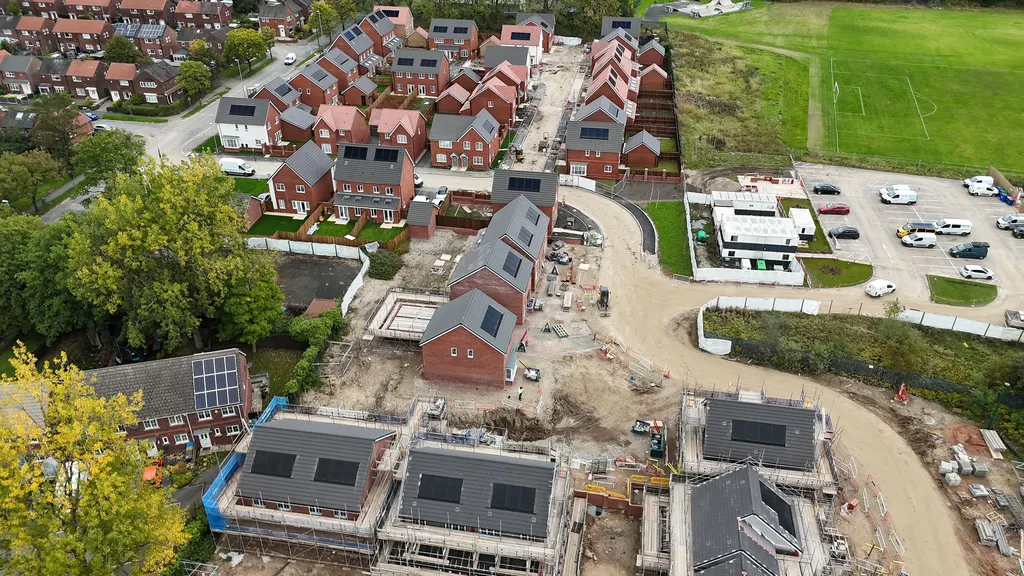 Solar PV on new-build homes in Ashton — aerial view of panels across multiple properties