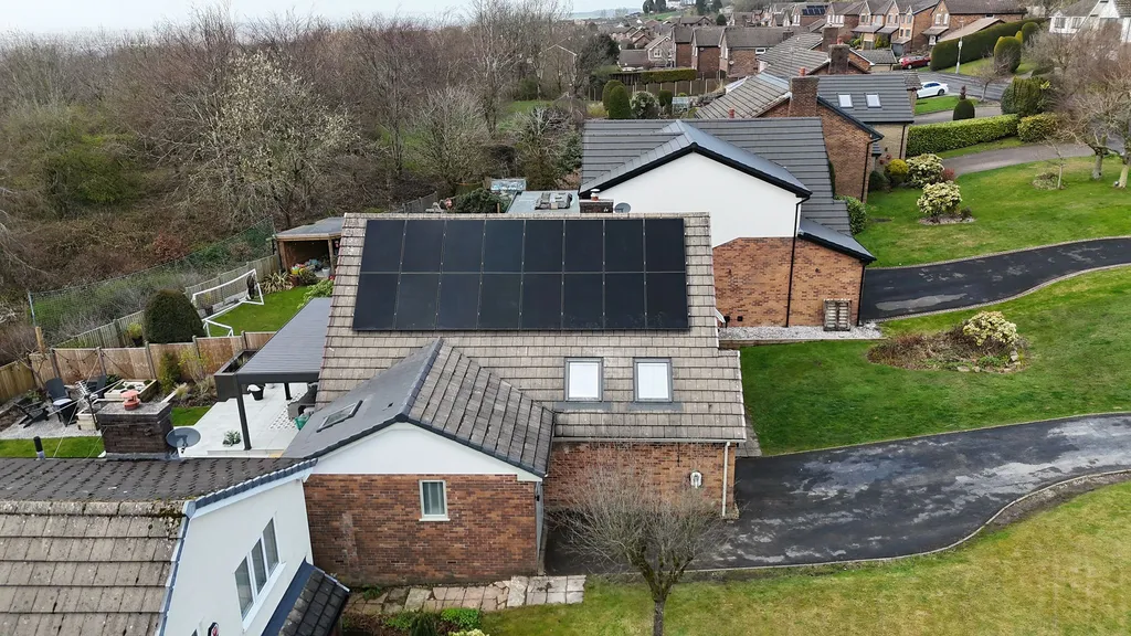 Home solar PV system installed by Manchester Renewables — close-up of panels on roof