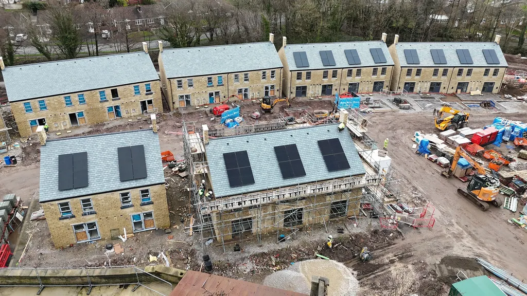 Glossop housing development with solar panels — overhead view of multiple properties