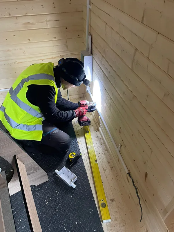 Sale garden office power and lighting install — Steels Electrical engineer at work