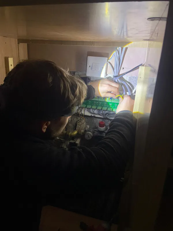Detail of a Heatmiser UFH wiring centre being diagnosed during a Bramhall fault-finding callout — Steels Electrical