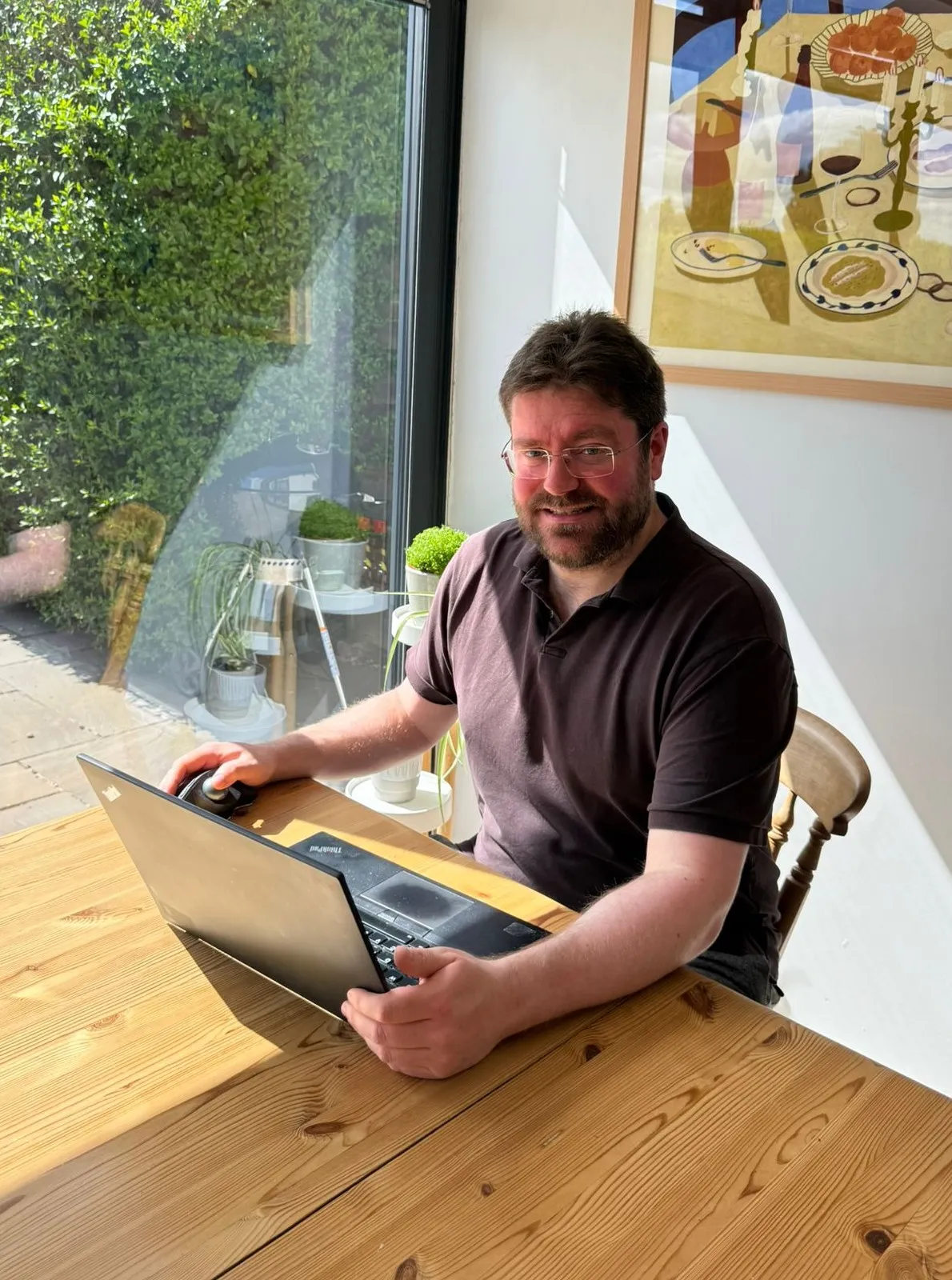 Andrew Clark, founder of Trade Search Marketing, working from his desk in Earl Shilton, Leicestershire